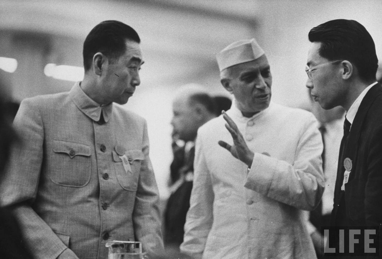Chinese Premier, Chou En-lai (left), with Nehru and an interpreter (right)